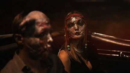 Alexander Skarsgard and Mia Goth in creepy flesh masks