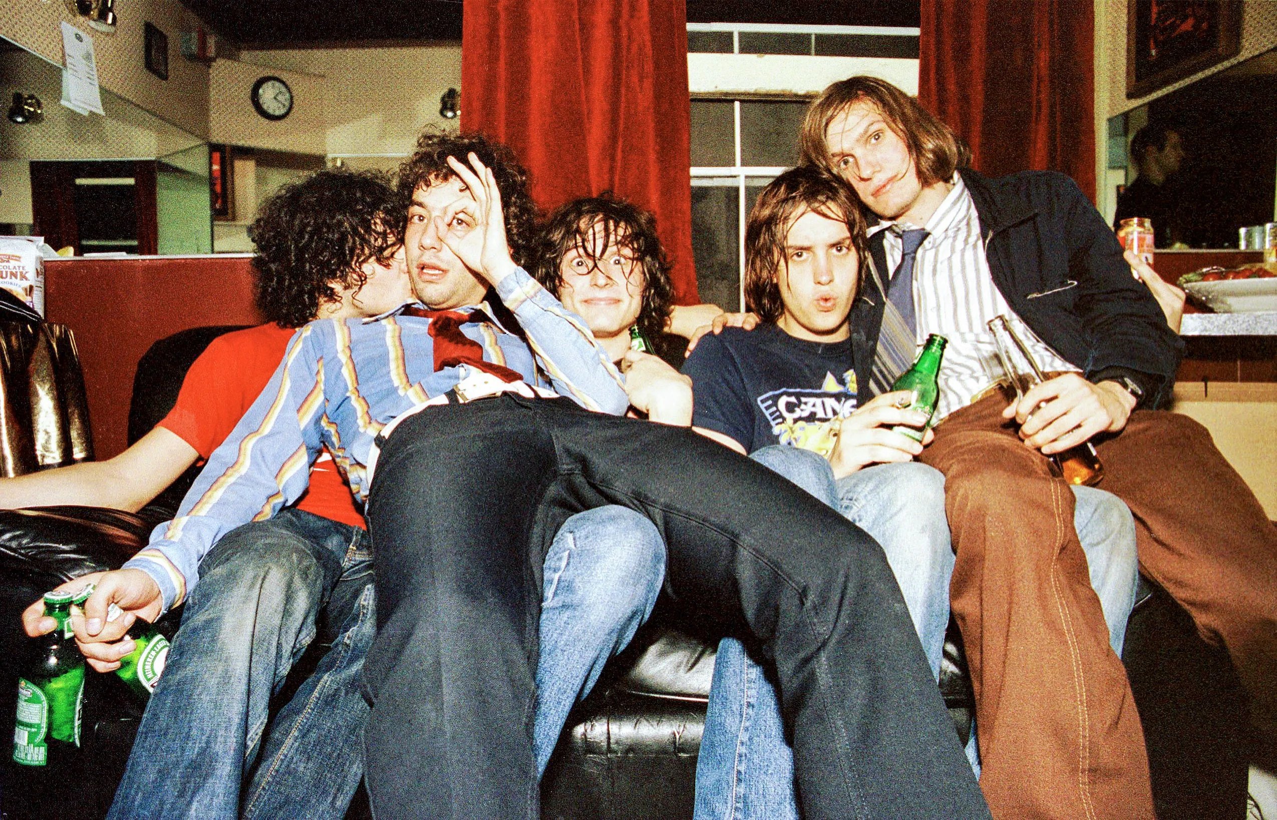 The Strokes havin fun when they were in their early days.