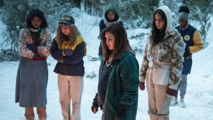 The cast of 'Yellowjackets' standing in the snow