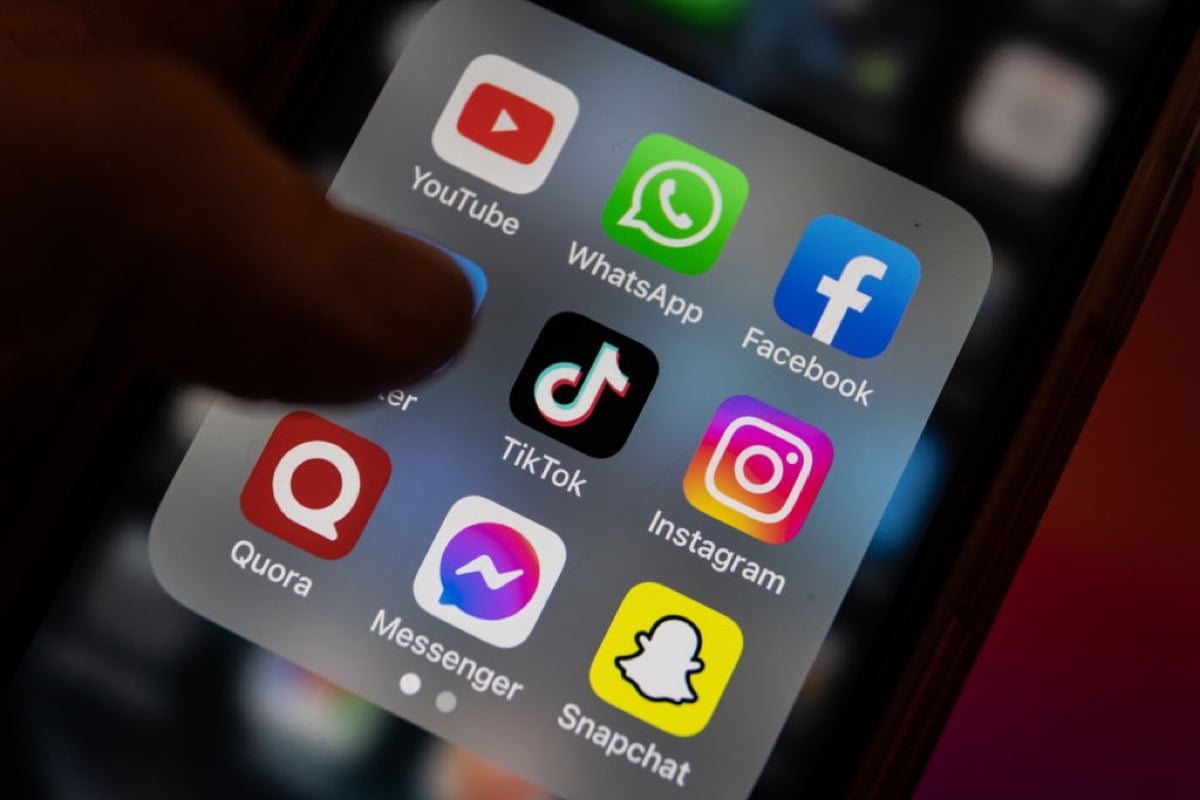 In this photo illustration the logo of Chinese online social media and video hosting service TikTok is displayed on a smartphone screen alongside that of that of YouTube, instant messaging software Whatsapp Facebook, Twitter, Instagram, Quora, Facebook Messenger and Snapchat.