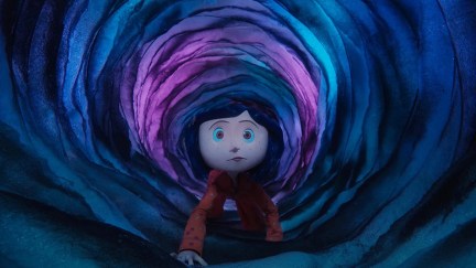 Coraline crawling through a tunnel