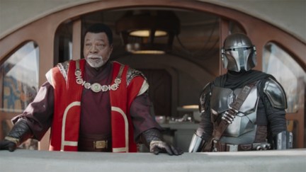 Greef Karga standing next to Din Djarin on the Mandalorian