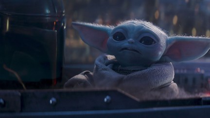 Grogu in a ship with Din in season 3 of The Mandalorian