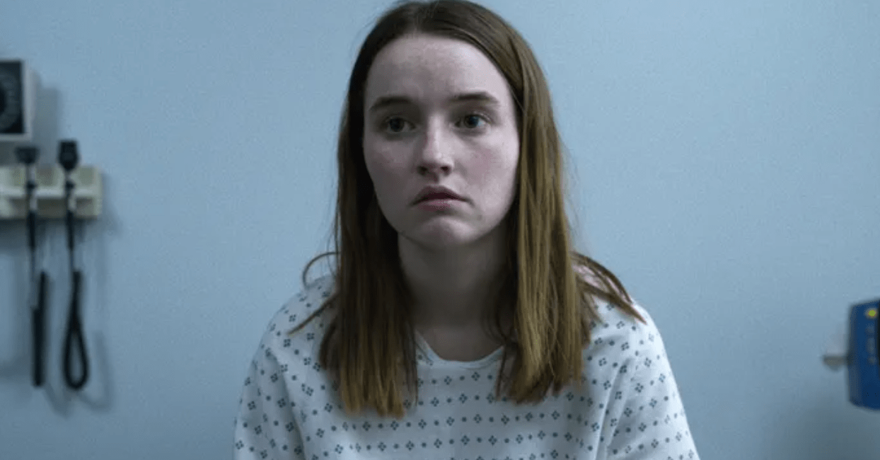 Kaitlyn Dever wears a hospital gown