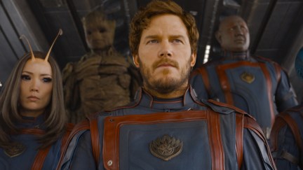 Peter stands in the entrance to the ship, with the other Guardians behind him.