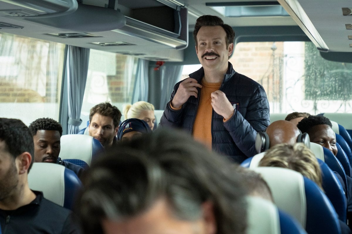 Ted stands on the team bus, with all the Richmond players in their seats.