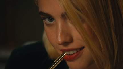 Margaret Qualley in SANCTUARY (via Neon