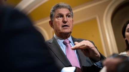 Joe Manchin speaks to reporters.