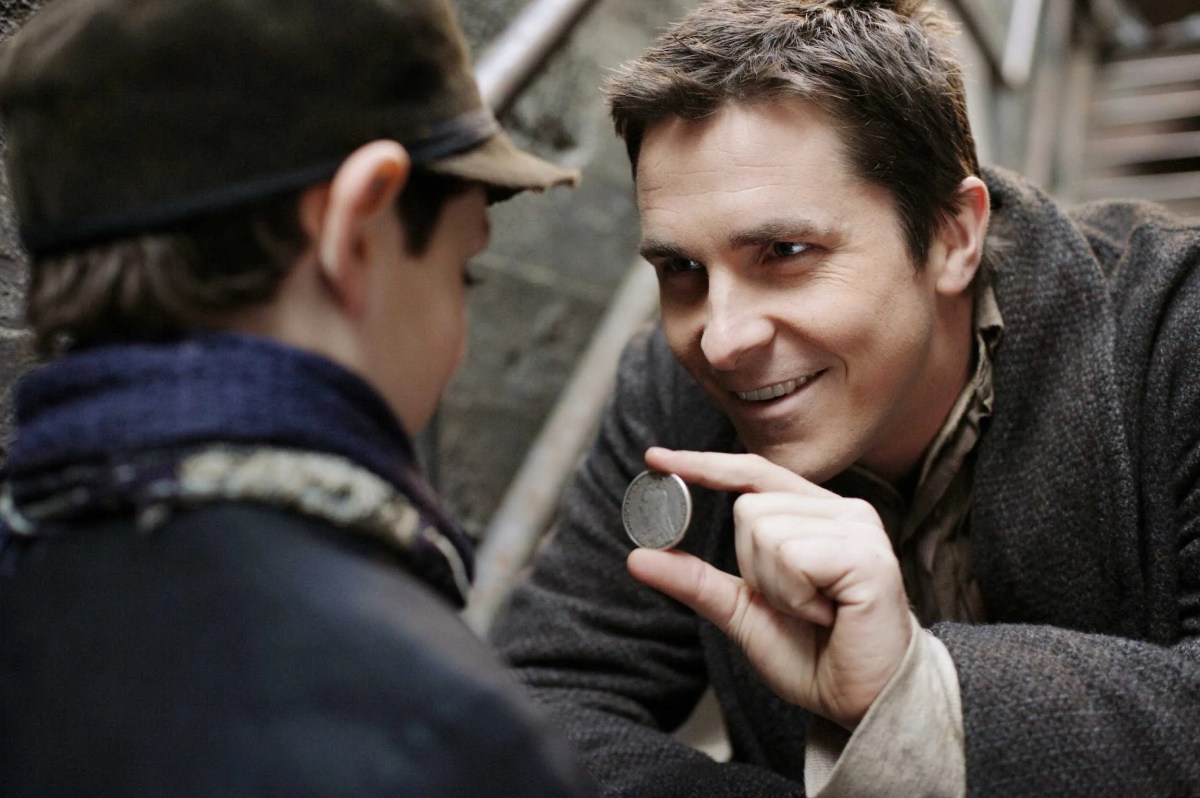 Christian Bale doing magic for an urchin in the Prestige