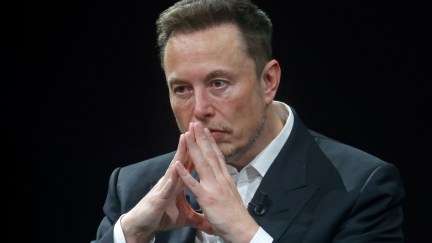 Elon Musk looks pensive.