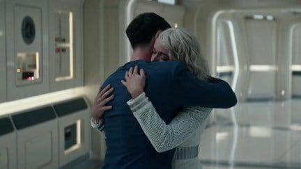 Spock and Chapel share an emotional hug in the hallways of the Enterprise.