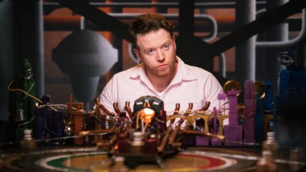 Brennan Lee Mulligan as The Game Master in Dimension 20 Mentopolis (via Dropout)