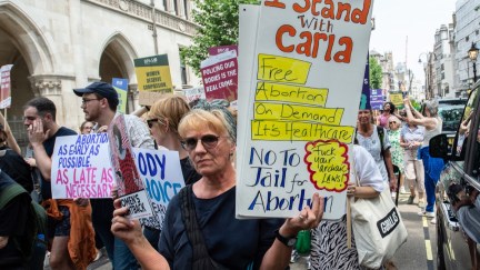 Abortion rights campaigners march from The Royal Court of Justice to Downing Street