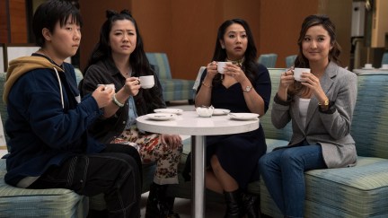 All four girls debrief with tea after a crazy night.