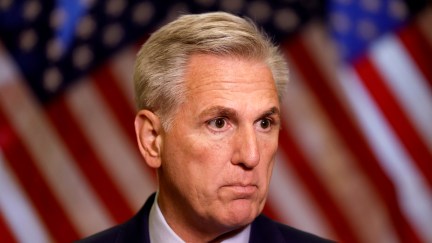 Kevin McCarthy stares blankly.