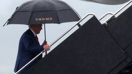 Trump with his sad umbrella