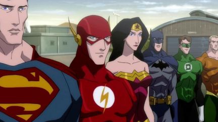 An animated Justice League stands in a row outside in 