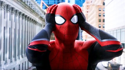 Tom Holland as Spider-Man holding his head in Spider-Man: Homecoming