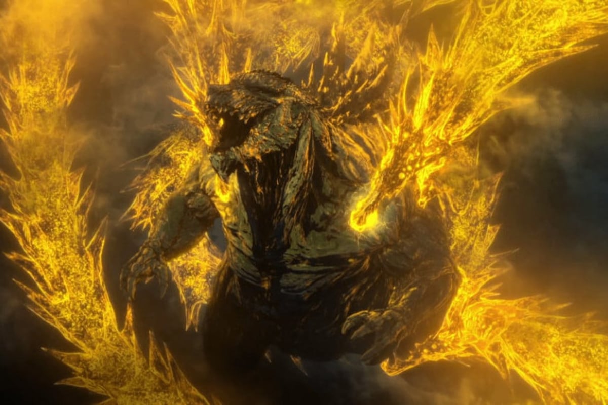 Still from Godzillah the Planet Eater; Godzillah is surrounded by yellow flames.