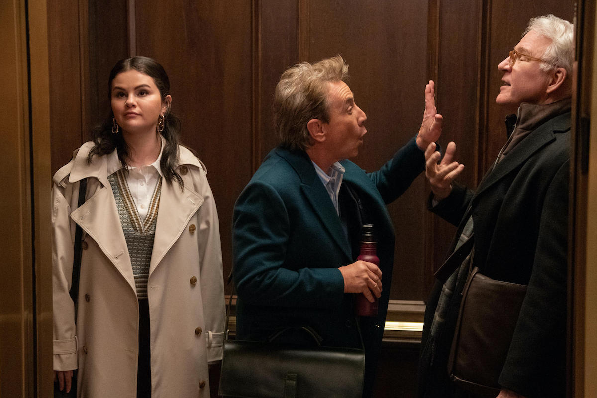 Martin Short as Oliver Putnam, Selena Gomez as Mabel Mora and Steve Martin as Charles-Haden Savage argue in an elevator in Only Murders in the Building season 3