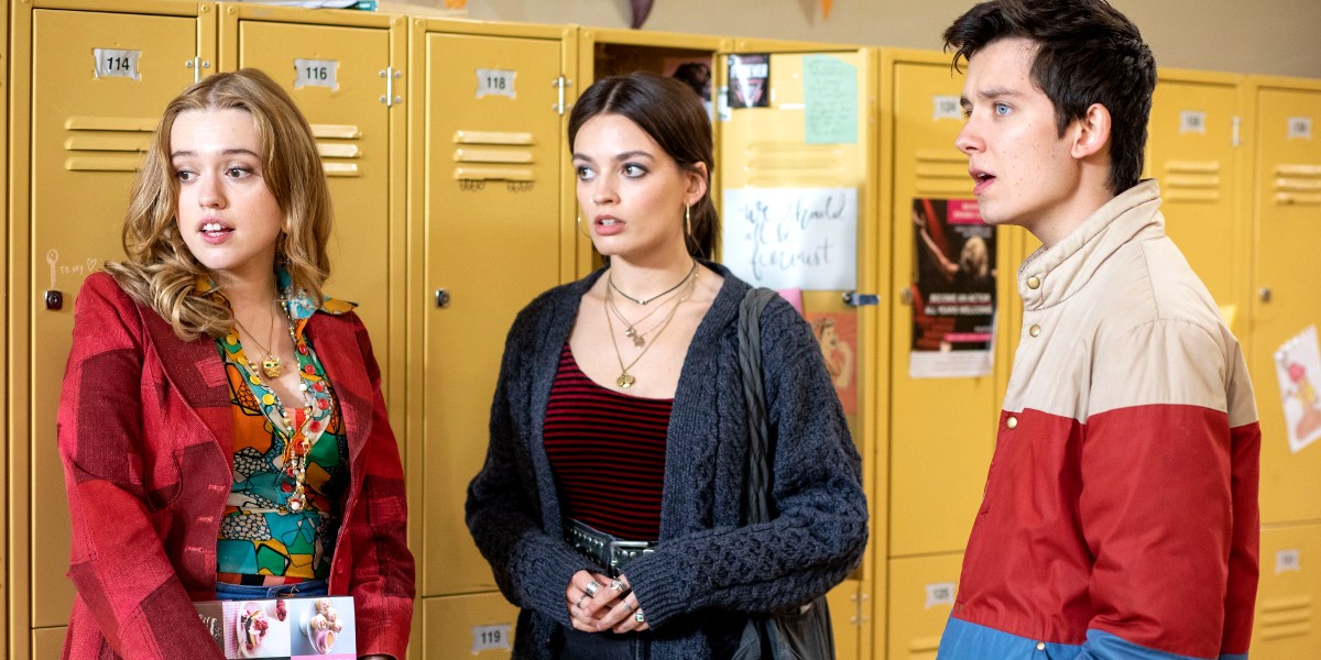 Aimee Lou Wood as Aimee, Emma Mackey as Maeve, and Asa Butterfield as Otis in Sex Education