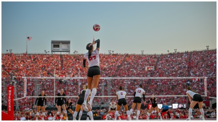 LINCOLN, NEBRASKA - AUGUST 30: Harper Murray #27 of the Nebraska Cornhuskers serves against the Omaha Mavericks at Memorial Stadium on August 30, 2023 in Lincoln, Nebraska.