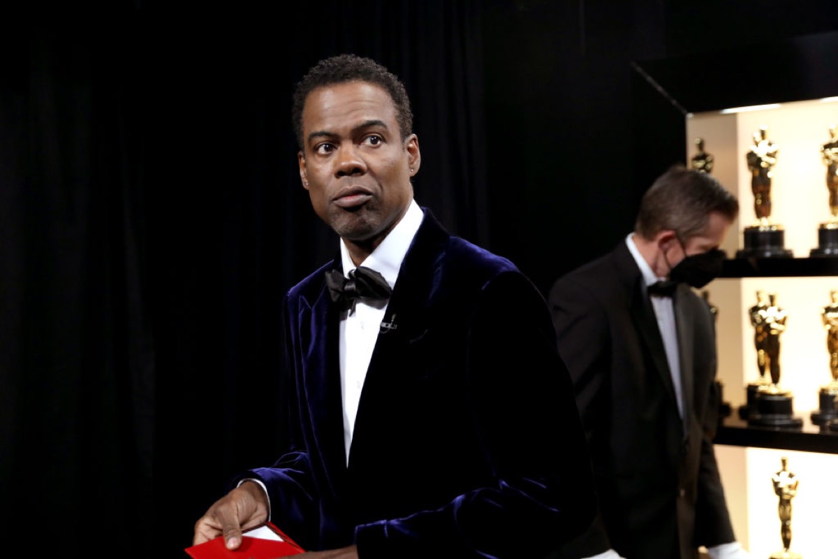 Chris Rock looked unhappy at the Oscars.