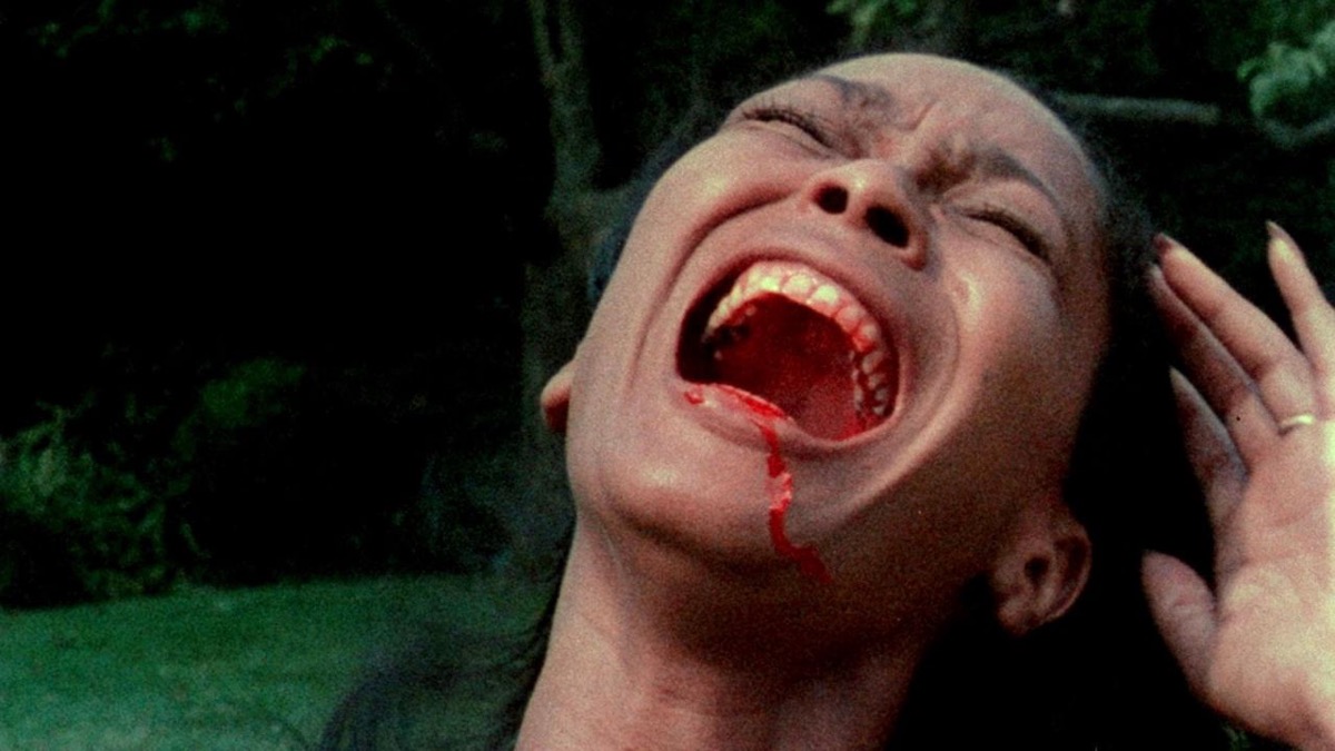 A woman with blood in her mouth screams in "Ganja and Hess"