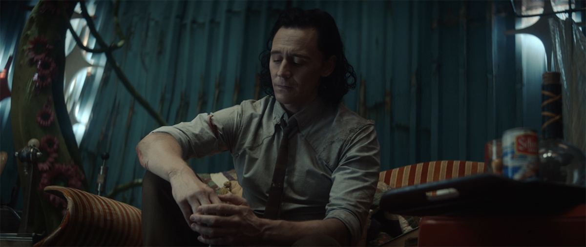 Loki sad drinking with all the different Lokis