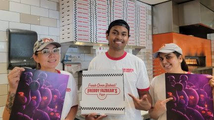 Blaze Pizza workers with Freddy Fazbear Pizza Boxes