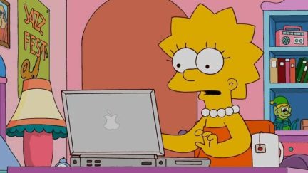 Lisa Simpson sits at her computer with a cup of tea ready to write on 'The Simpsons.'