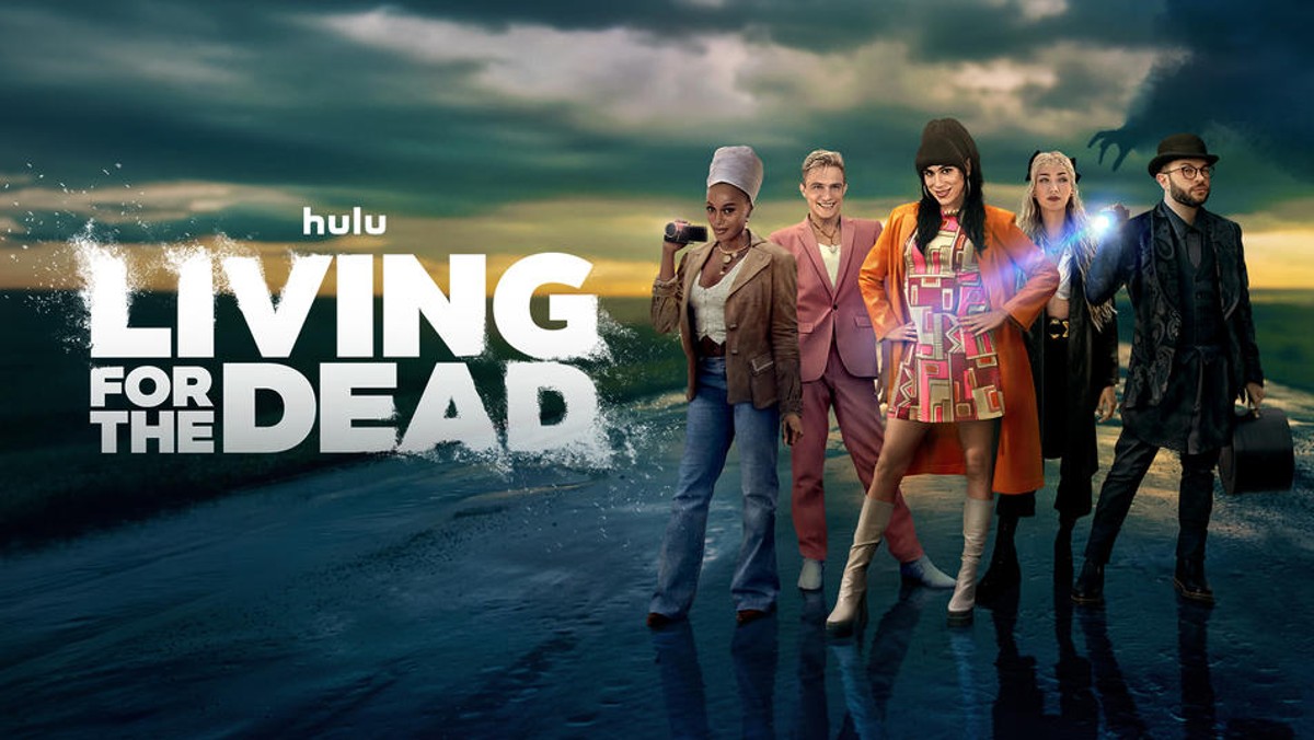 Five people stand on a spooky road in 'Living for the Dead.'