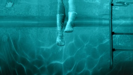 Feet dangle ominously in a swimming pool in the poster for 'Night Swim'