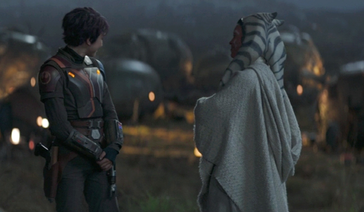 Natasha Liu Bordizzo as Sabine Wren and Rosario Dawson as Ahsoka Tano in the Ahsoka finale, looking out over the Noti encampment on Peridea