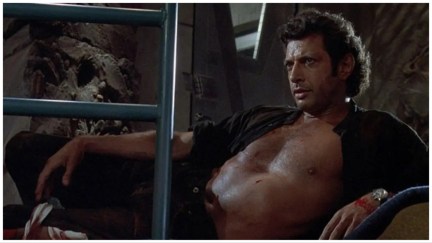 Jeff Goldblum reclines shirtless in 'Jurassic Park'.