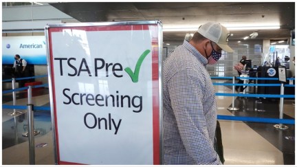 CHICAGO, ILLINOIS - OCTOBER 19: A passenger enters a Transportation Security Administration (TSA) checkpoint at O'Hare International Airport on October 19, 2020 in Chicago, Illinois. Yesterday the TSA reported that it had screened over 1 million passengers, representing the highest number of passengers screened at TSA checkpoints since March 17, 2020. During the week ending October 18, TSA screened 6.1 million passengers nationwide, the highest total since the start of the COVID-19 pandemic. (Photo by Scott Olson/Getty Images)