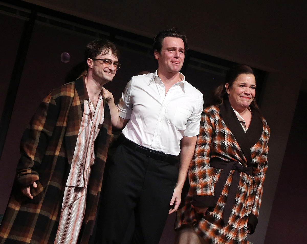 NEW YORK, NEW YORK - OCTOBER 8: (L-R) Daniel Radcliffe, Jonathan Groff and Lindsay Mendez during the opening night curtain call for "Stephen Sondheim