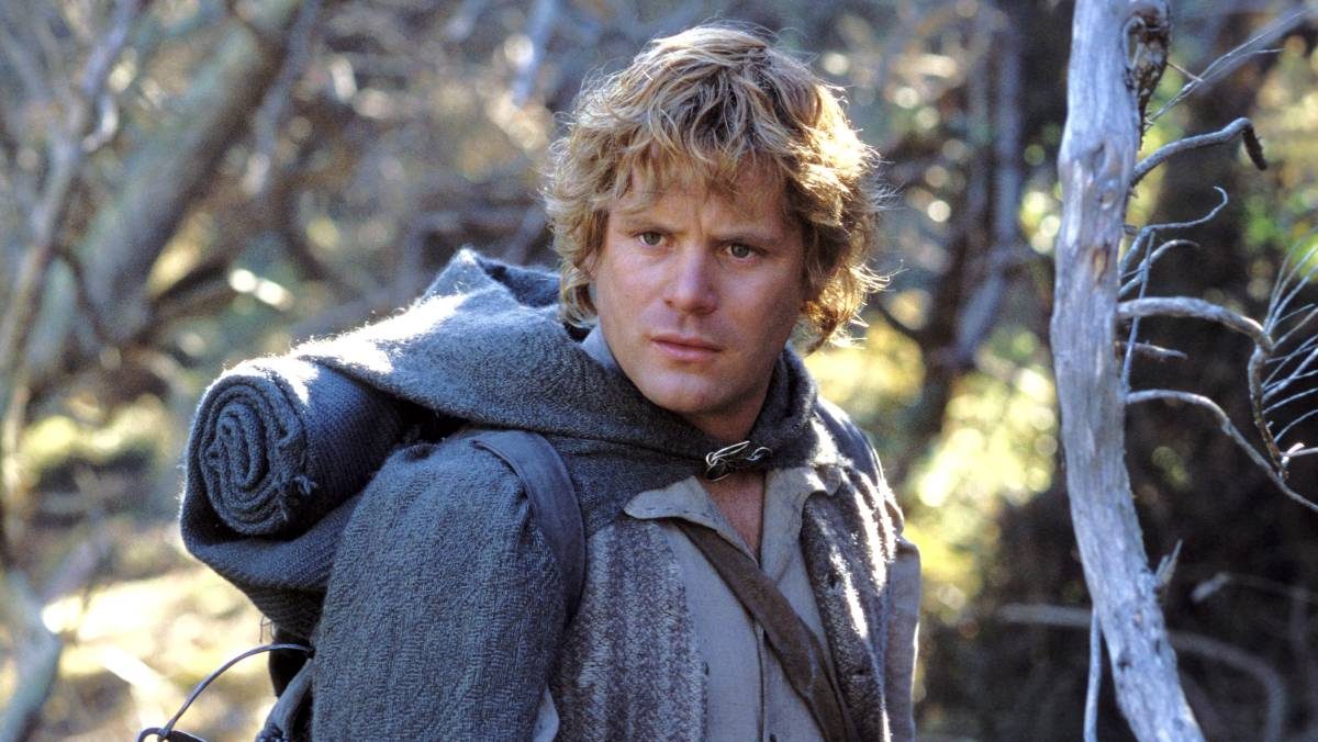 Sean Astin as Samwise Gamgee standing in the forest in 'The Lord of the Rings.'