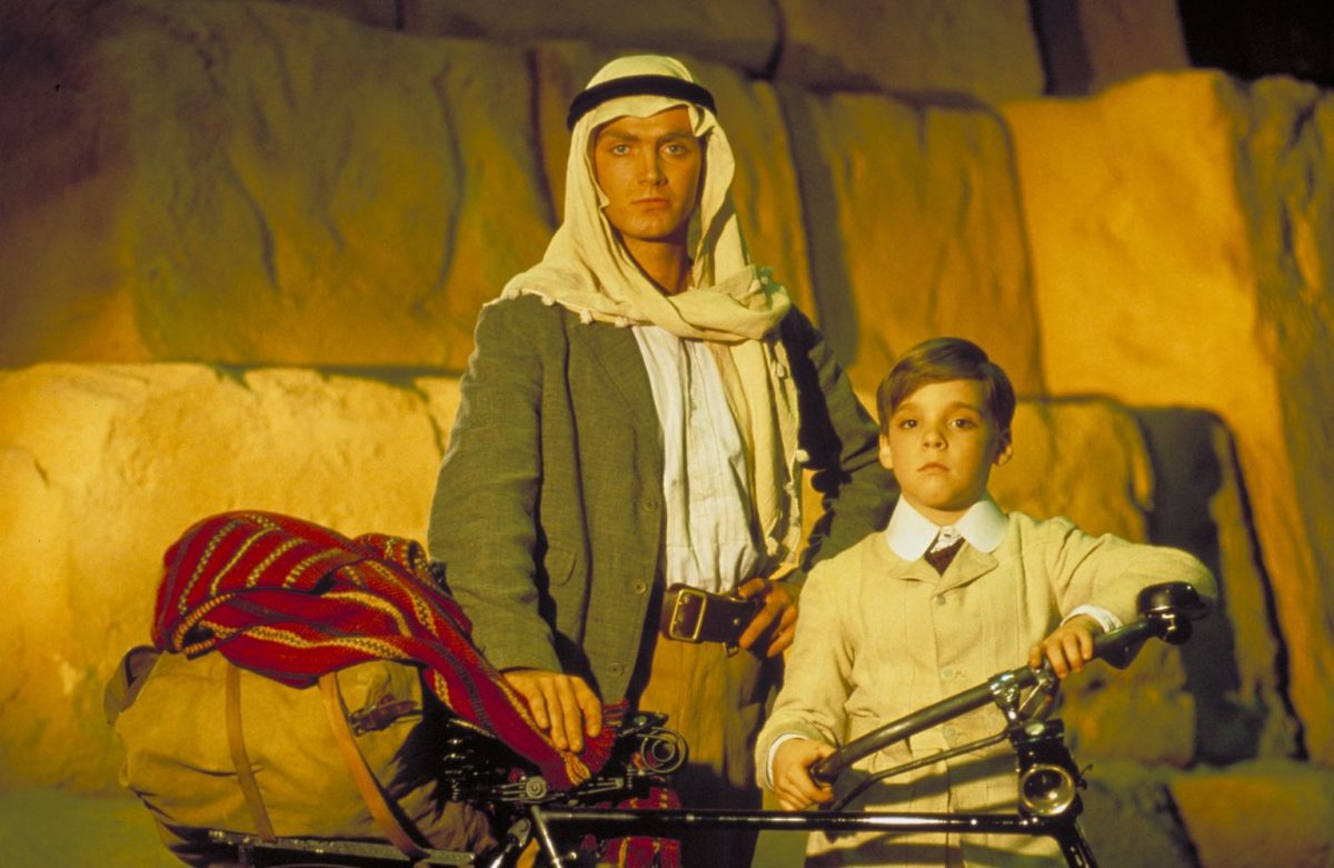 Young Indiana Jones with Lawrence of Arabia and his bike