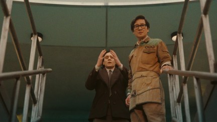 Tom Hiddleston as Loki and Ke Huy Quan as OB standing in the Temporal Loom chamber in Loki season 2 episode 5.