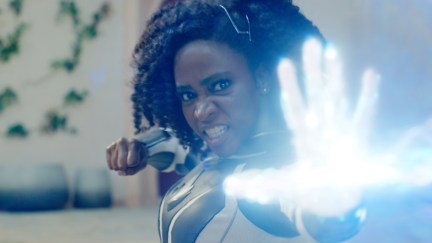 Monica Rambeau shoots energy from her hand.