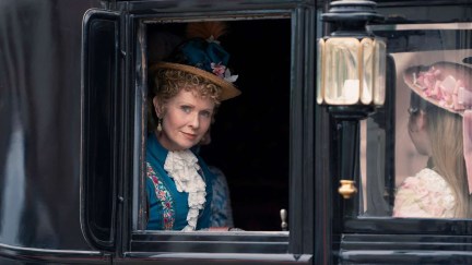 Cynthia Nixon as Ada peeking out of a carriage window in The Gilded Age season 2