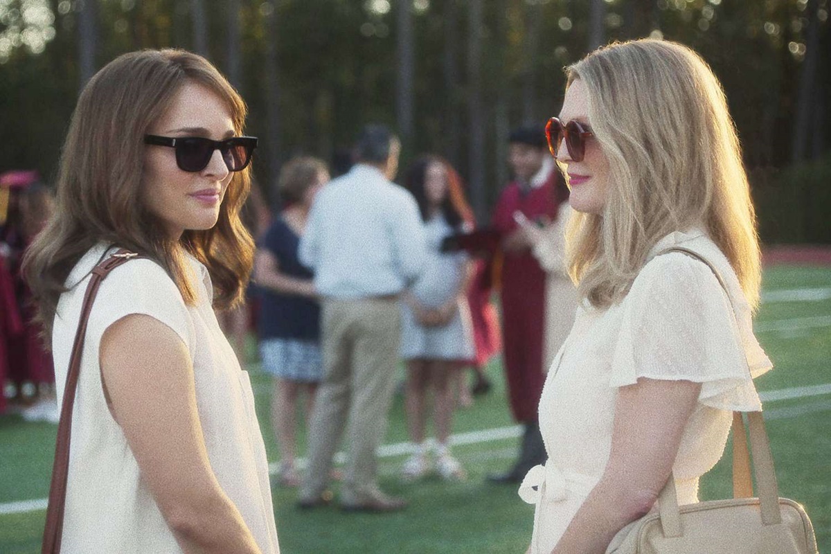 Natalie Portman and Julianne Moore wearing sunglasses in May December