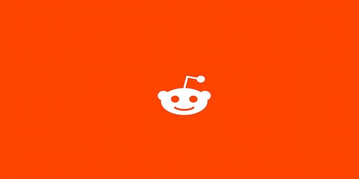 Reddit logo on a blank orange banner.