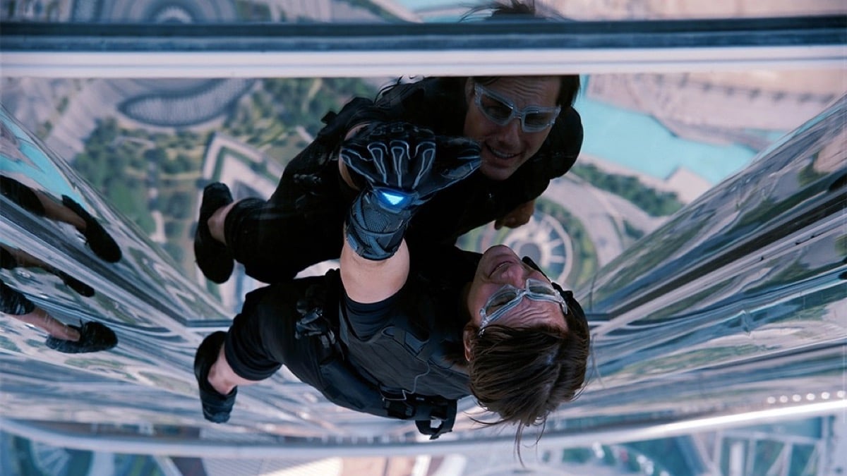 A man scales the side of a skyscraper in "Mission Impossible 4"