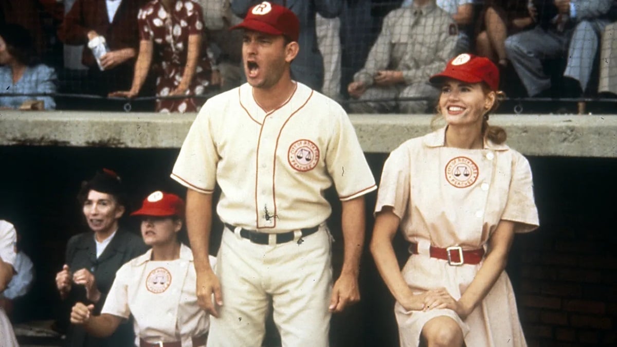 Tom Hanks and Geena Davis yell from the dugout in A League Of Their Own