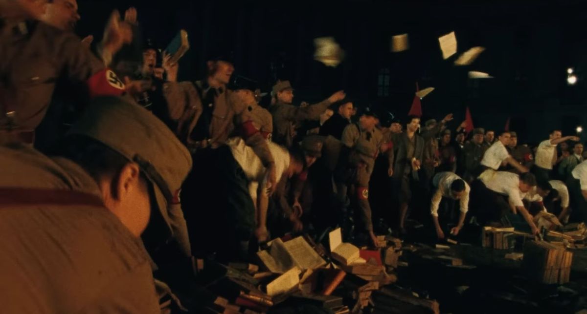 Nazis burning books in 1933 in 'Origin.' 