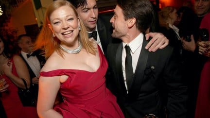 Sarah Snook, Nicholas Braun, and Kieran Culkin talking excitedly at the Emmys