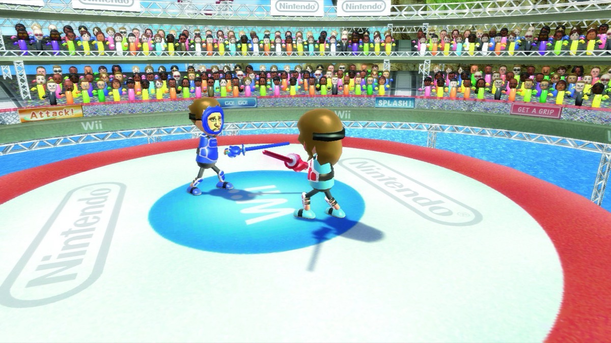 Two mii's sword fight in a stadium in "Wii Sports Resort" 