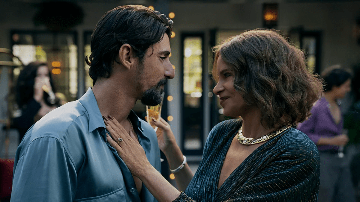 Alberto Guerra as Dario Sepulveda, Sofia Vergara as Griselda blanco during Dario's birthday celebration from Netflix series Griselda